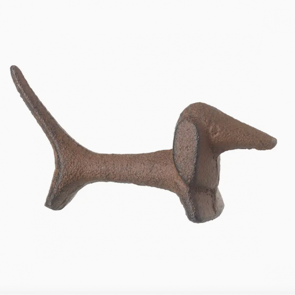 Iron Sausage Dog a unique ornament. This stylised miniature pup is a stylish home accessory that adds a fabulously quirky touch to any room